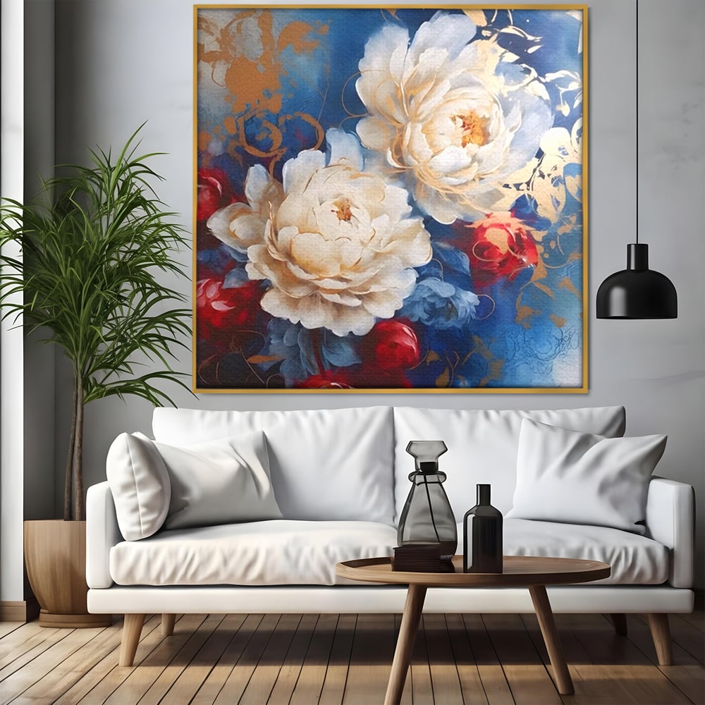 Tablou canvas cu pictura abstracta cu bujori albi, in rama de aluminiu auriu, pe perete intr-un living